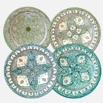 grønnfargede tallerkener med en diameter på 25 centimeter.