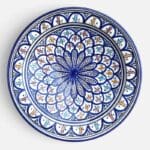Blue dish with colored pattern and details in light blue, red and yellow, measuring 42 cm, handmade in Morocco.