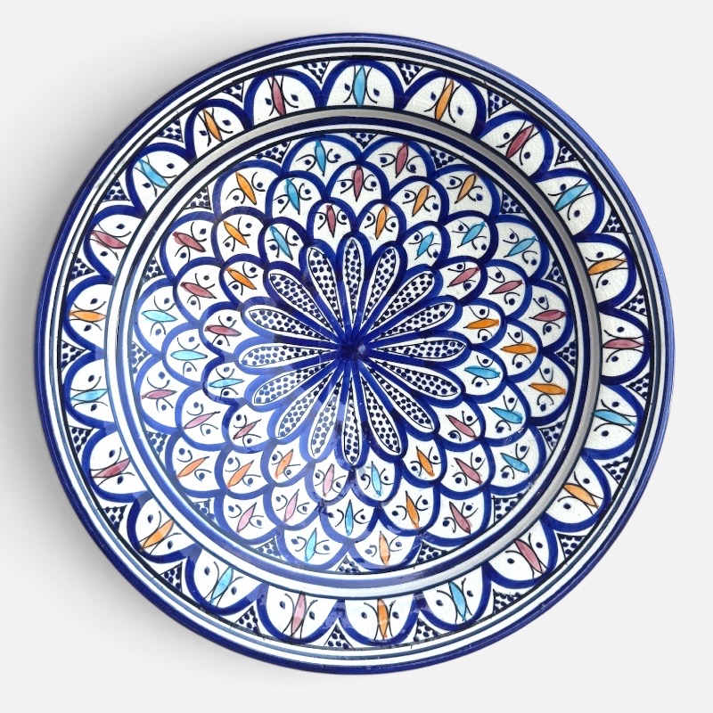 Blue dish with colored pattern and details in light blue, red and yellow, measuring 42 cm, handmade in Morocco.