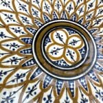 Brown dish with detailed pattern, measures 42 cm, handmade in Morocco.