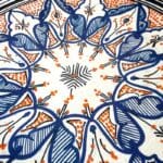 Blue dish with colored pattern and details in orange, measuring 42 cm, handmade in Morocco.