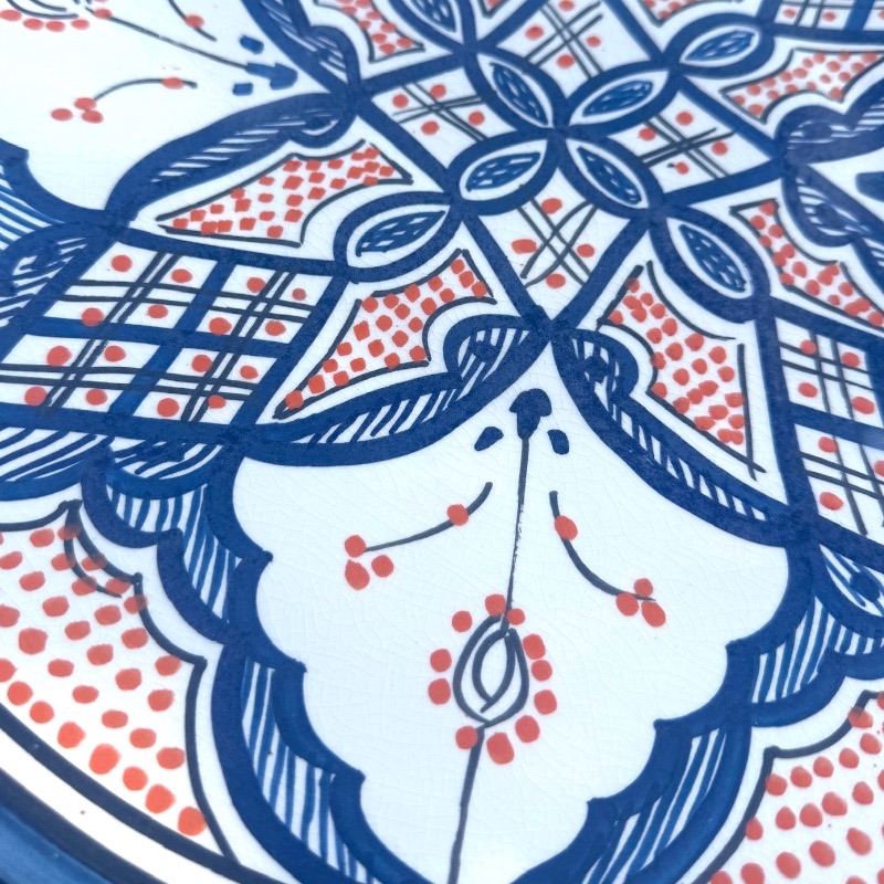 Blue dish with colored pattern and details in orange, measuring 42 cm, handmade in Morocco.
