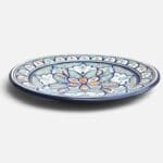 Blue dish with colored pattern and details in green, red, light blue and yellow, measuring 42 cm, handmade in Morocco.