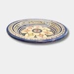 Beautiful couscous dish in ceramic measuring 28 centimeters. Blue with a colored pattern, and handmade in Morocco.
