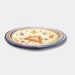 Beautiful couscous dish in ceramic measuring 28 centimeters. Blue with a colored pattern, and handmade in Morocco.