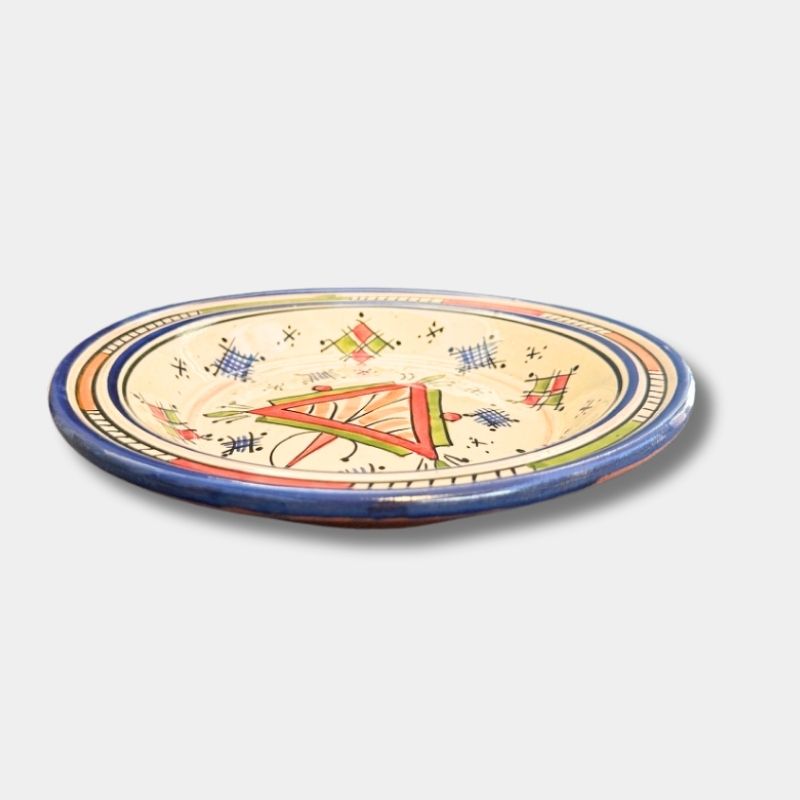 Beautiful couscous dish in ceramic measuring 28 centimeters. Blue with a colored pattern, and handmade in Morocco.