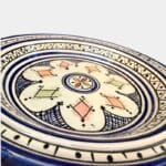 Beautiful couscous dish in ceramic measuring 28 centimeters. Blue with a colored pattern, and handmade in Morocco.