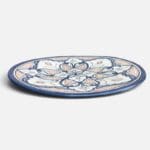 Blue dish with colored pattern and details in orange, measuring 42 cm, handmade in Morocco.