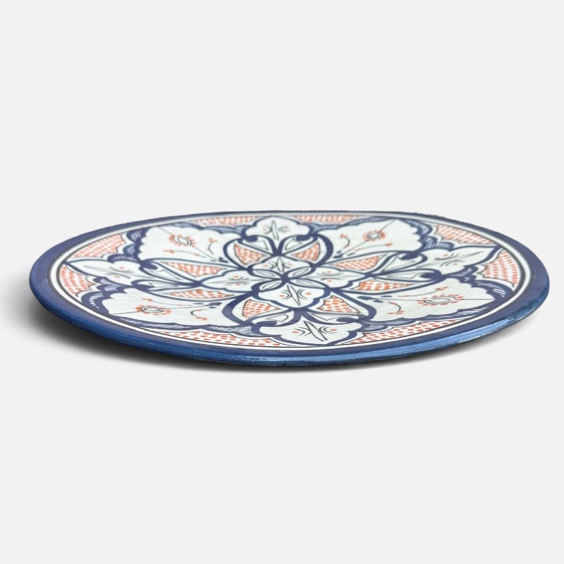 Blue dish with colored pattern and details in orange, measuring 42 cm, handmade in Morocco.