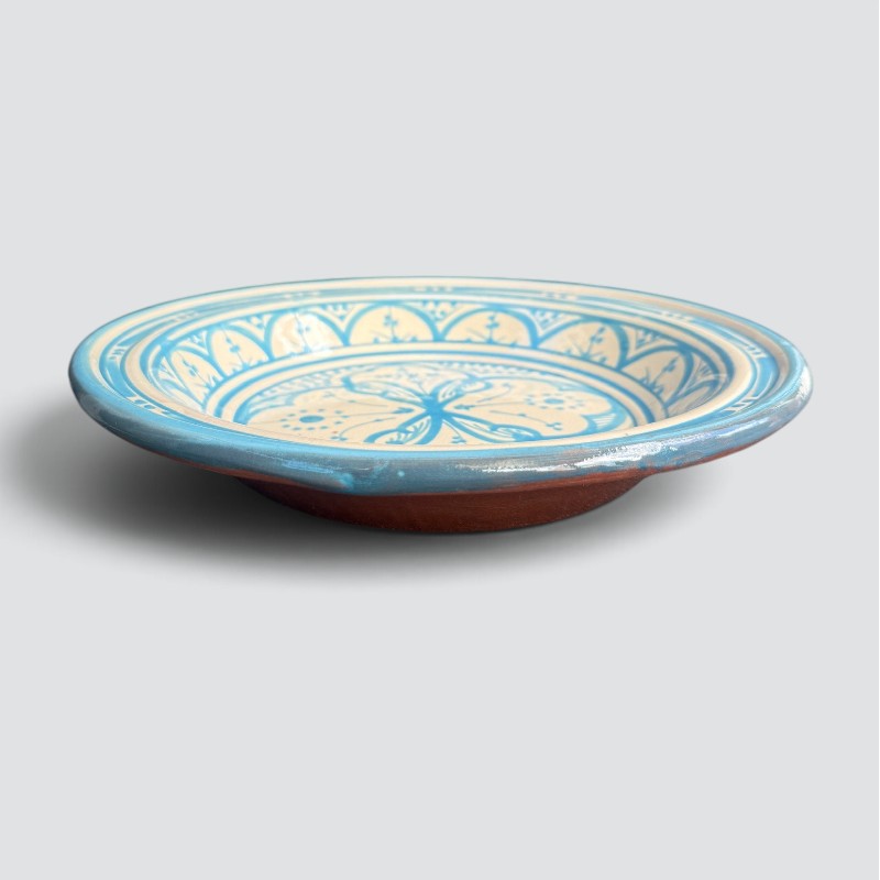 Beautiful couscous dish in ceramic measuring 28 centimeters. Light blue, and handmade in Morocco.